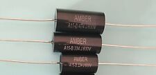 NEW STOCK* 10 x  PURE BLACK 0.10uF / 630 VOLT POLYCARBONATE  AXIAL CAPACITOR  picture