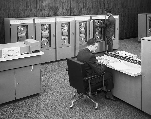 Two Men Working with Early Mainframe Computer 1955 Old Photo - Two Men Working w Two Men Working with Early Mainframe Computer 1955 Old Photo - Two Men Working w