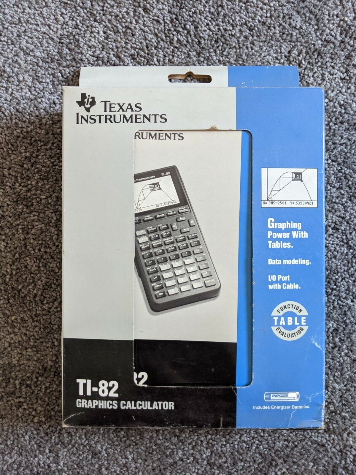 Texas TI-82 Graphing Calculator in box with manual and link cable