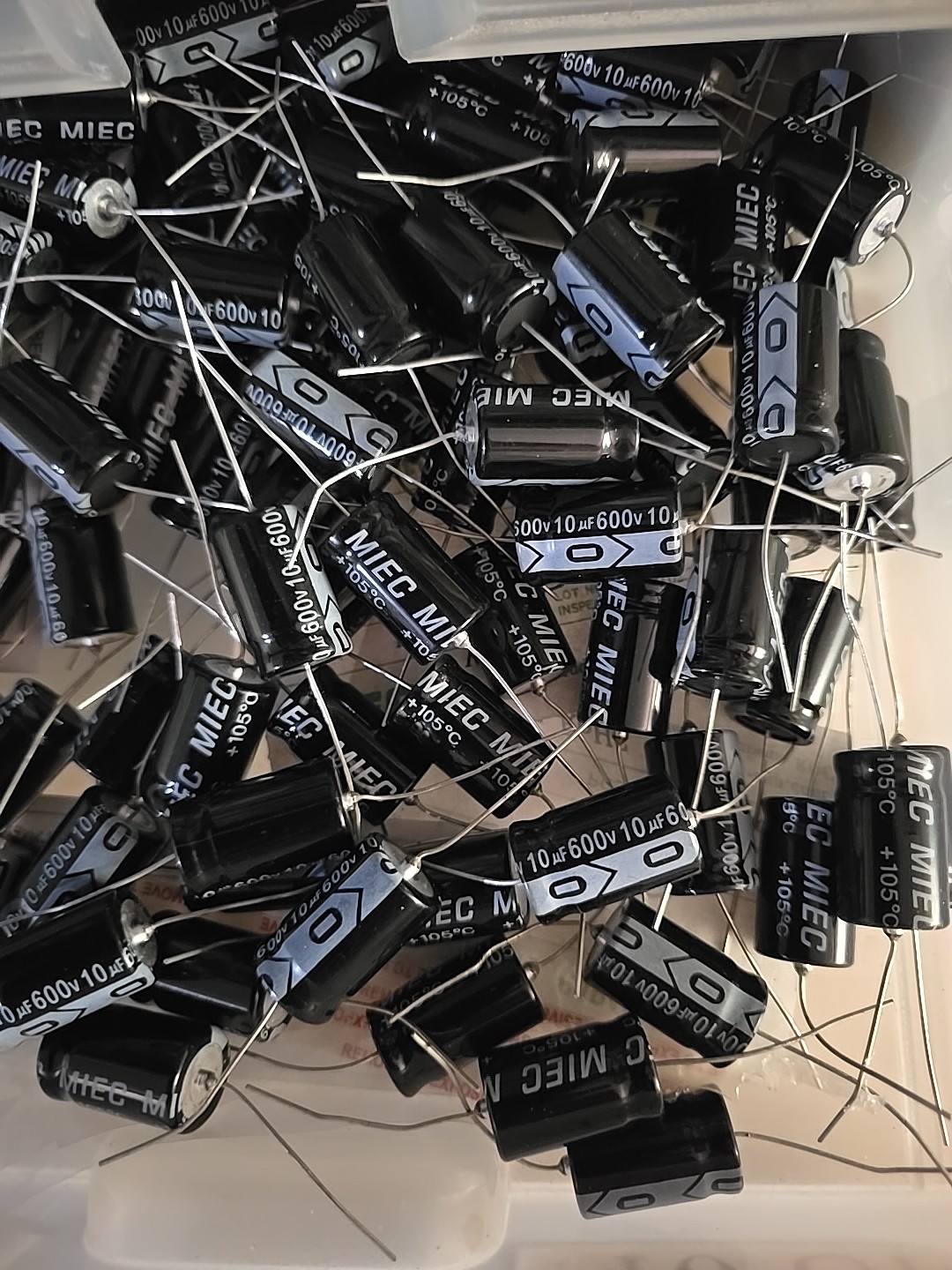 QTY 10 New MIEC 10UF 600V 105C Axial Electrolytic Capacitors. ( 650-volt surge ) QTY 10 New MIEC 10UF 600V 105C Axial Electrolytic Capacitors. ( 650-volt surge )