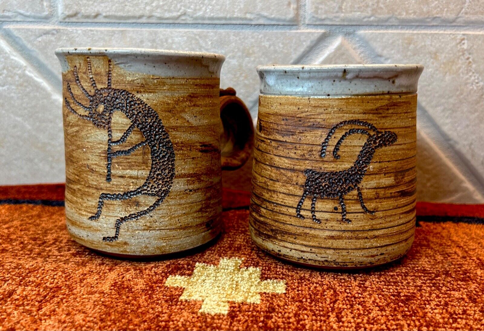 Vintage Kokopelli and Bighorn Ram etched Pottery Coffee Mugs by Delma Tangreen