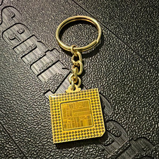 Intel Pentium Processor Keychain, Gold Tone, 1992, Original Advertising picture