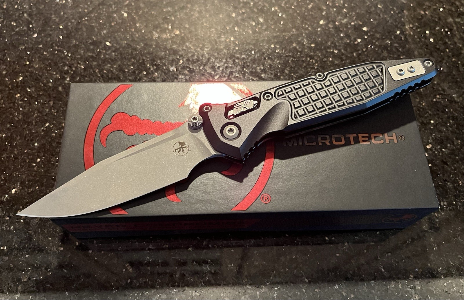 Microtech SOCOM Ram-Lok Black Aluminum Frag Scales, Apocalyptic M390MK Blade Microtech SOCOM Ram-Lok Black Aluminum Frag Scales, Apocalyptic M390MK Blade